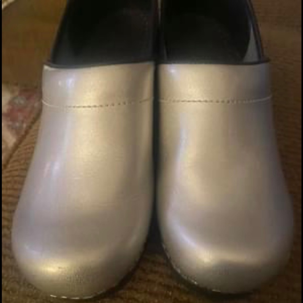 Excellent condition. Sanita silver clogs size 38